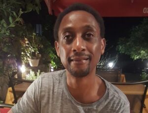 Image of our Tech Buddy volunteer, Tofara