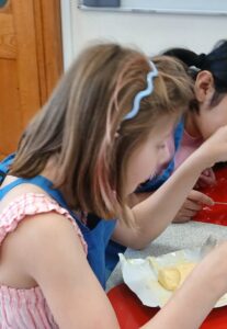A photo of Lux at a cooking session