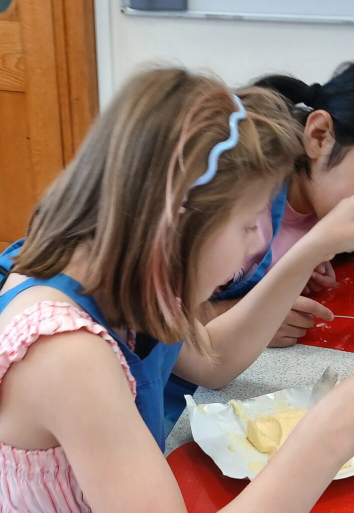 A photo of Lux at a cooking session