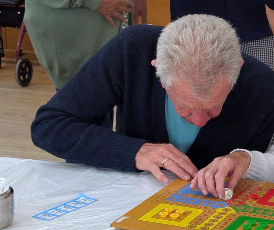 A photo of graham playing ludo