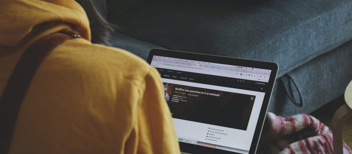 A person doing work on their laptop